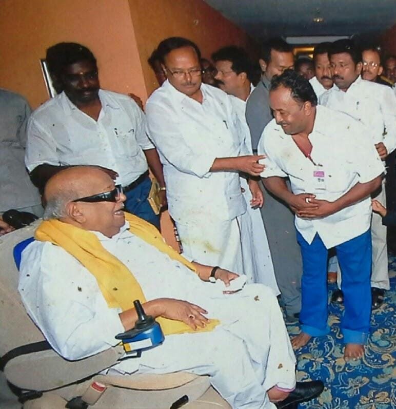 Father presenting to Former Chief Minister of Tamil Nadu, Dr. Kalaignar M. Karunanidhi